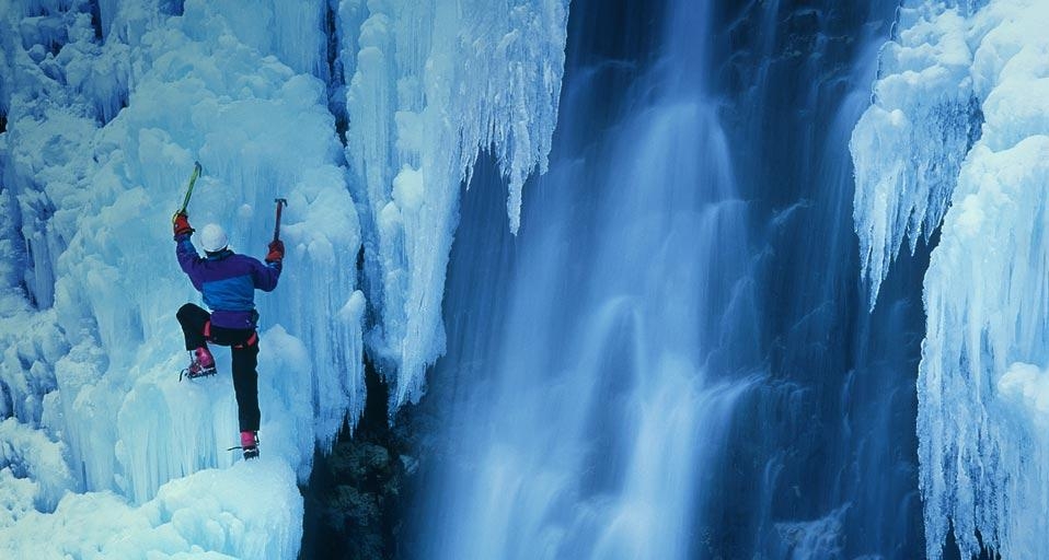 Ice climber ascending a frozen waterfall in Telluride, Colorado, USA (© Brian Bailey/Getty Images &copy; (Bing United Kingdom)