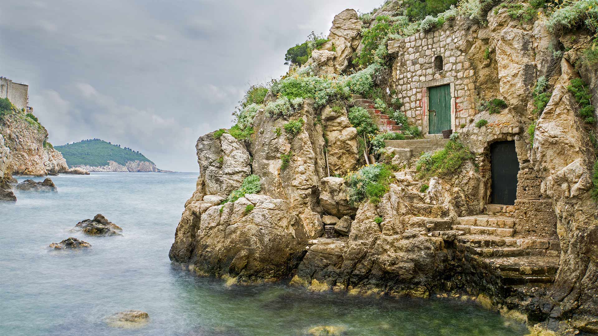 Wooden doors and a stone path at the base of Fort Lovrijenac in Kolorina Bay, Dubrovnik (© Barbara Vallance/Getty Images)(Bing United Kingdom)