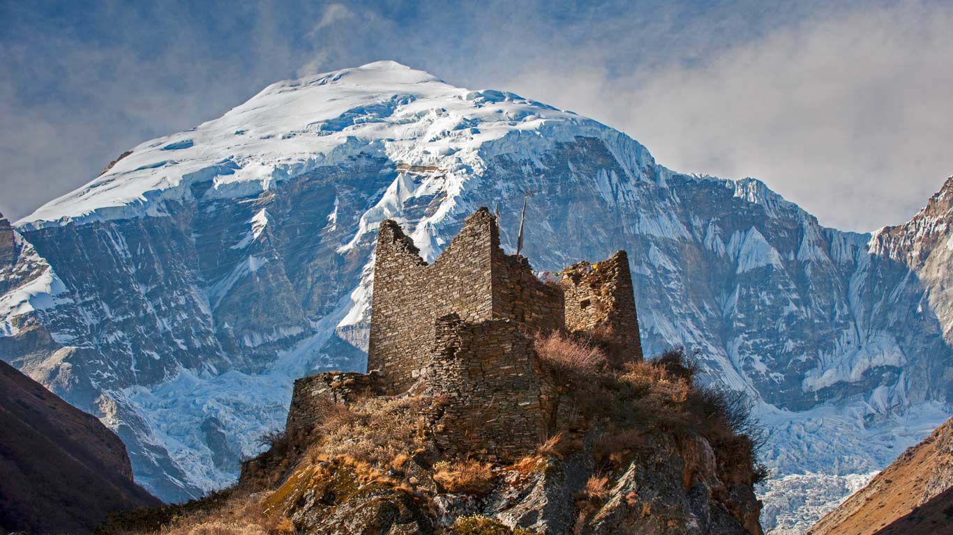 An ancient dzong by Jomolhari mountain, Bhutan (© Alex Treadway/plainpicture)(Bing United Kingdom)