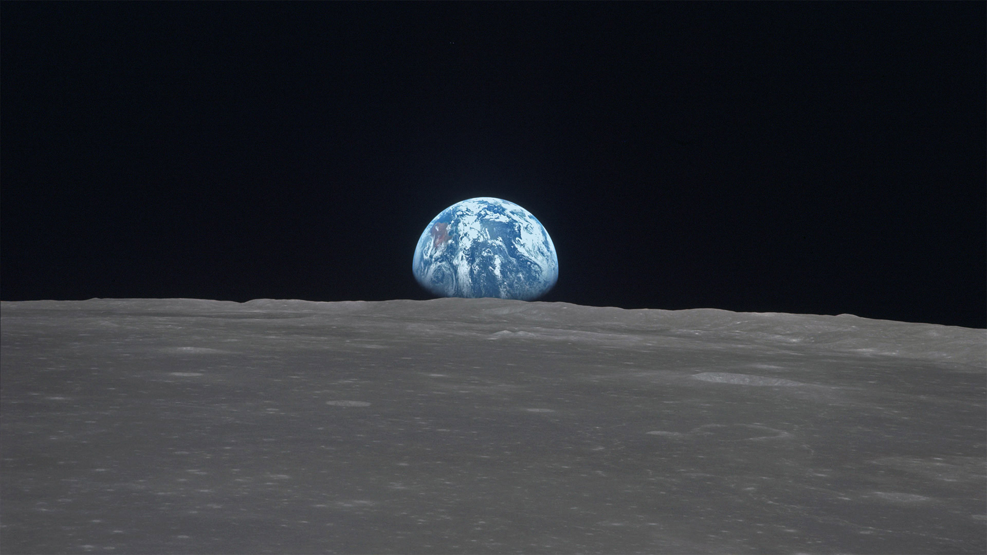 The Earth rises over Mare Smythii on the Moon (© Image Science and Analysis Laboratory, NASA-Johnson Space Center)(Bing United Kingdom)