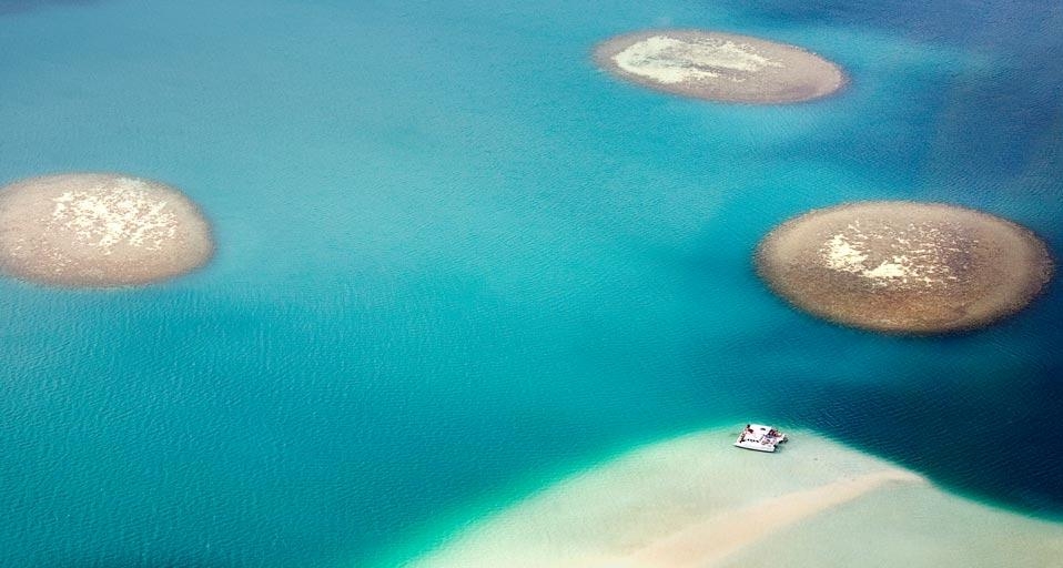 Aerial view of turquoise waters and sandbars in Oahu, Hawaii, USA (© Lynn Gail/Lonely Planet Images) &copy; (Bing United Kingdom)