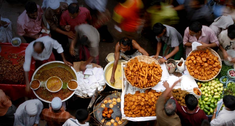 Bangladeshi street vendors sell food during the 1st day Ramadan -- Abir Abdullah/Corbis &copy; (Bing United States)