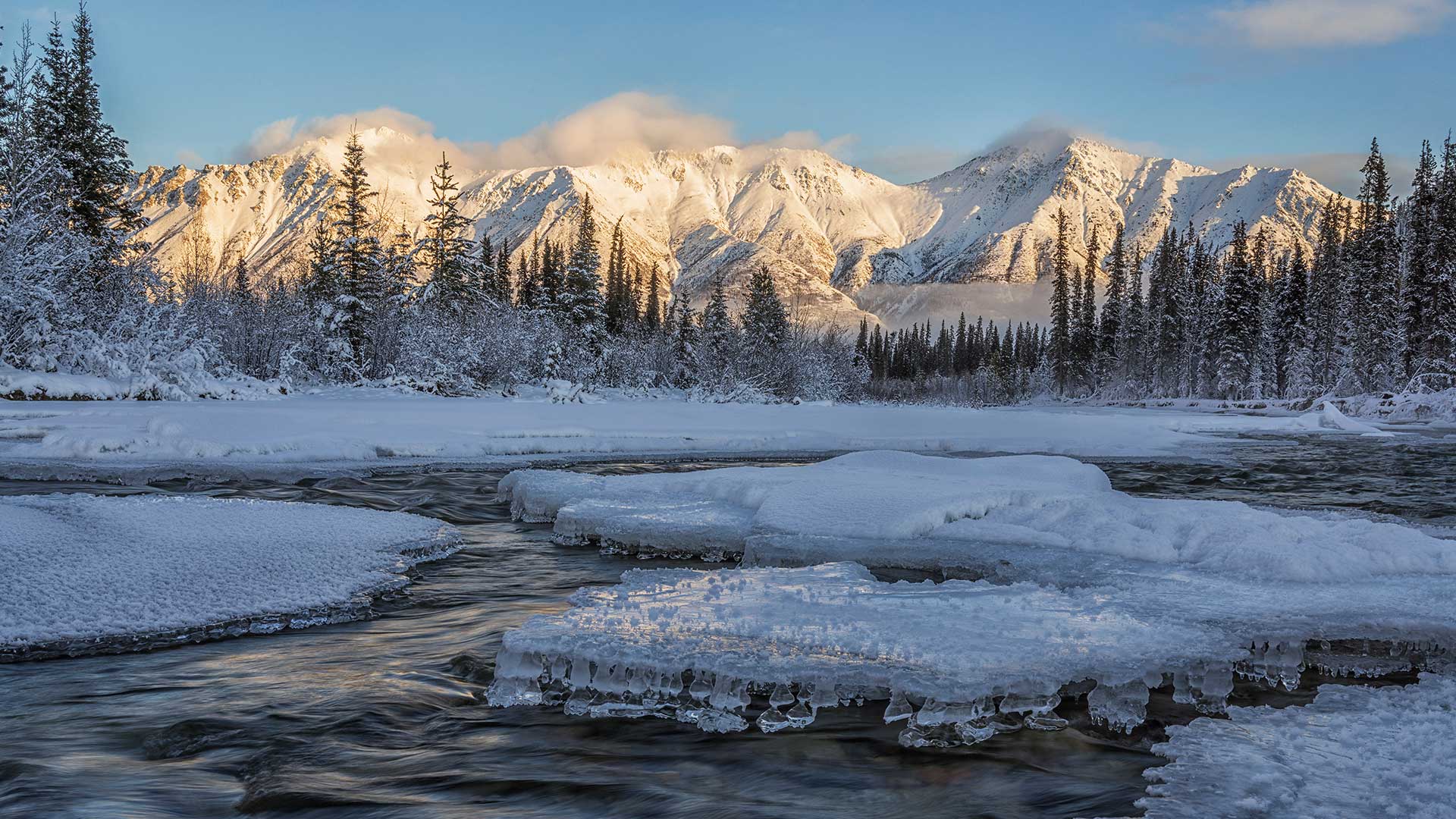 Sunset over the Wheaton River as the light hits Grey Ridge near Whitehorse, Yukon (© Robert Postma/Design Pics)(Bing Canada)