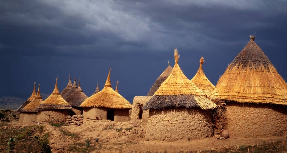 Round adobe huts with straw roofs in the Mandara Mountains, Cameroon -- Sylvain Grandadam/Getty Images &copy; (Bing Canada)