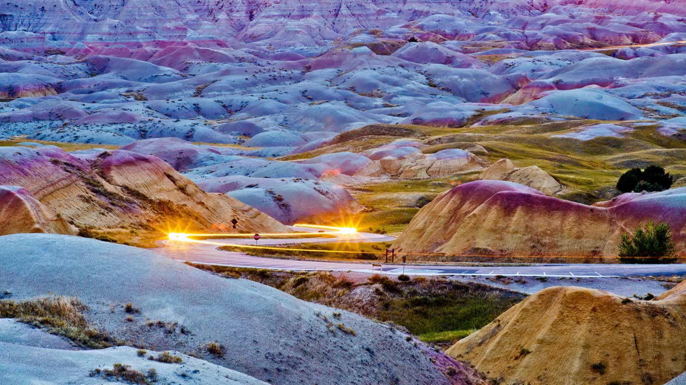 Headlights streaking through Badlands National Park, South Dakota (© Adam Hester/Getty Images)(Bing United States)