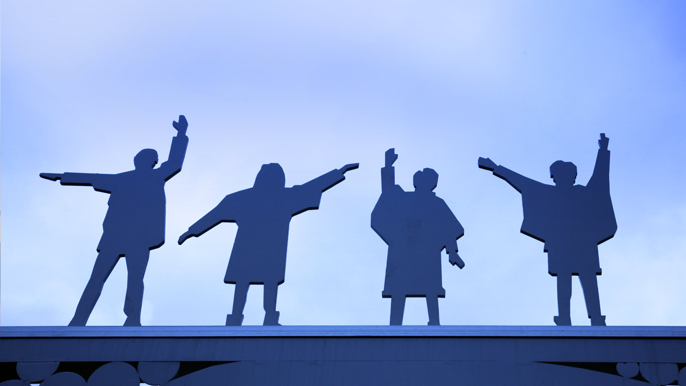 The Beatles depicted on a metal gate on Penny Lane, Liverpool, England (© Chris Brink/SuperStock)(Bing United States)