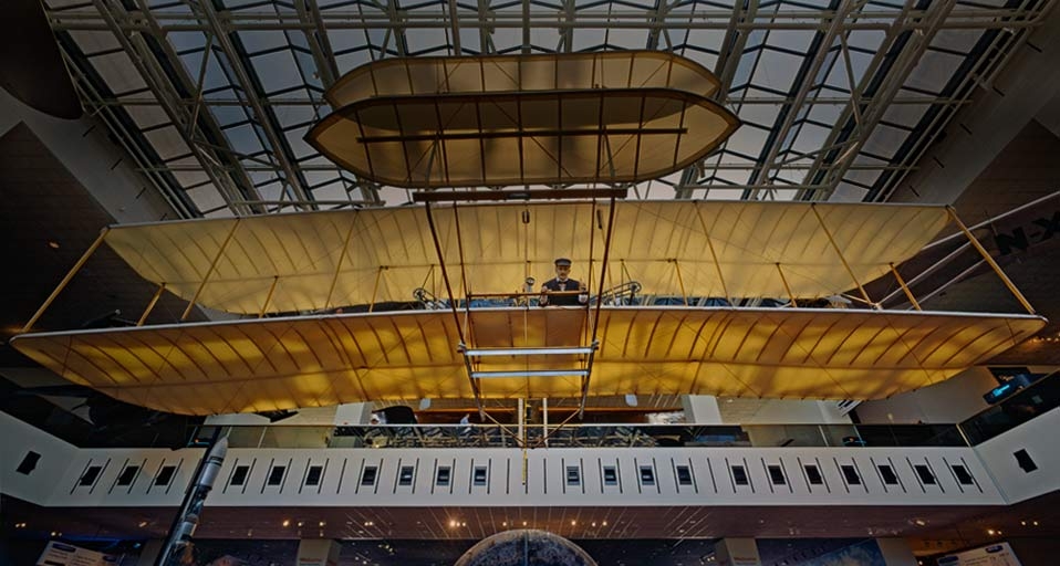 The 1903 Wright Flyer, hanging in the Milestones of Flight exhibit at the Smithsonian National Air and Space Museum in Washington DC, USA -- Smithsonian Institution/Corbis &copy; (Bing United Kingdom)