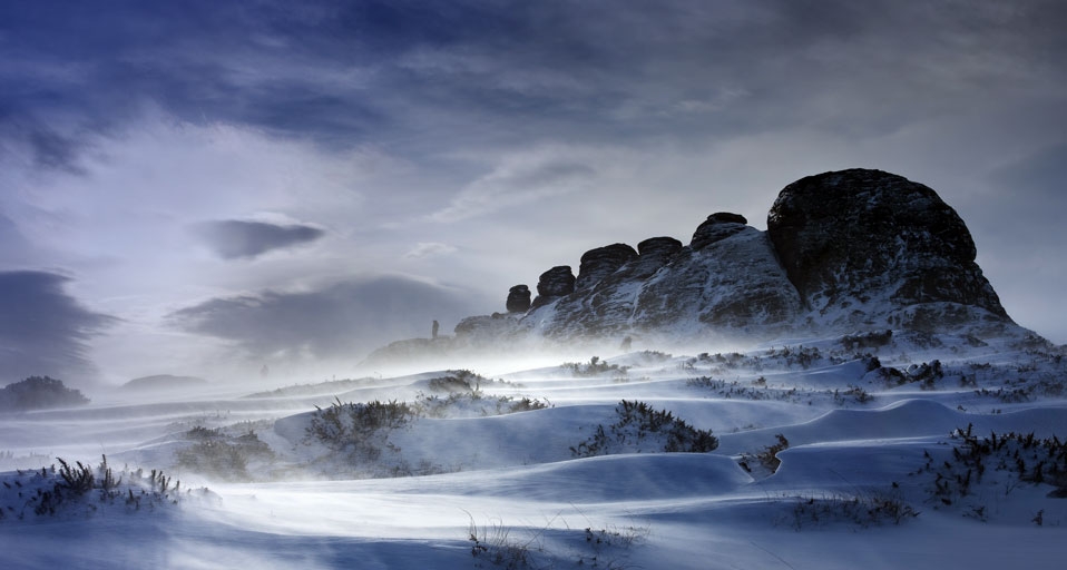 Haytor Rocks after a heavy snow fall, spin drift carried across the ground by strong winds, Dartmoor, Devon, England --  David Clapp/Photolibrary &copy; (Bing United Kingdom)