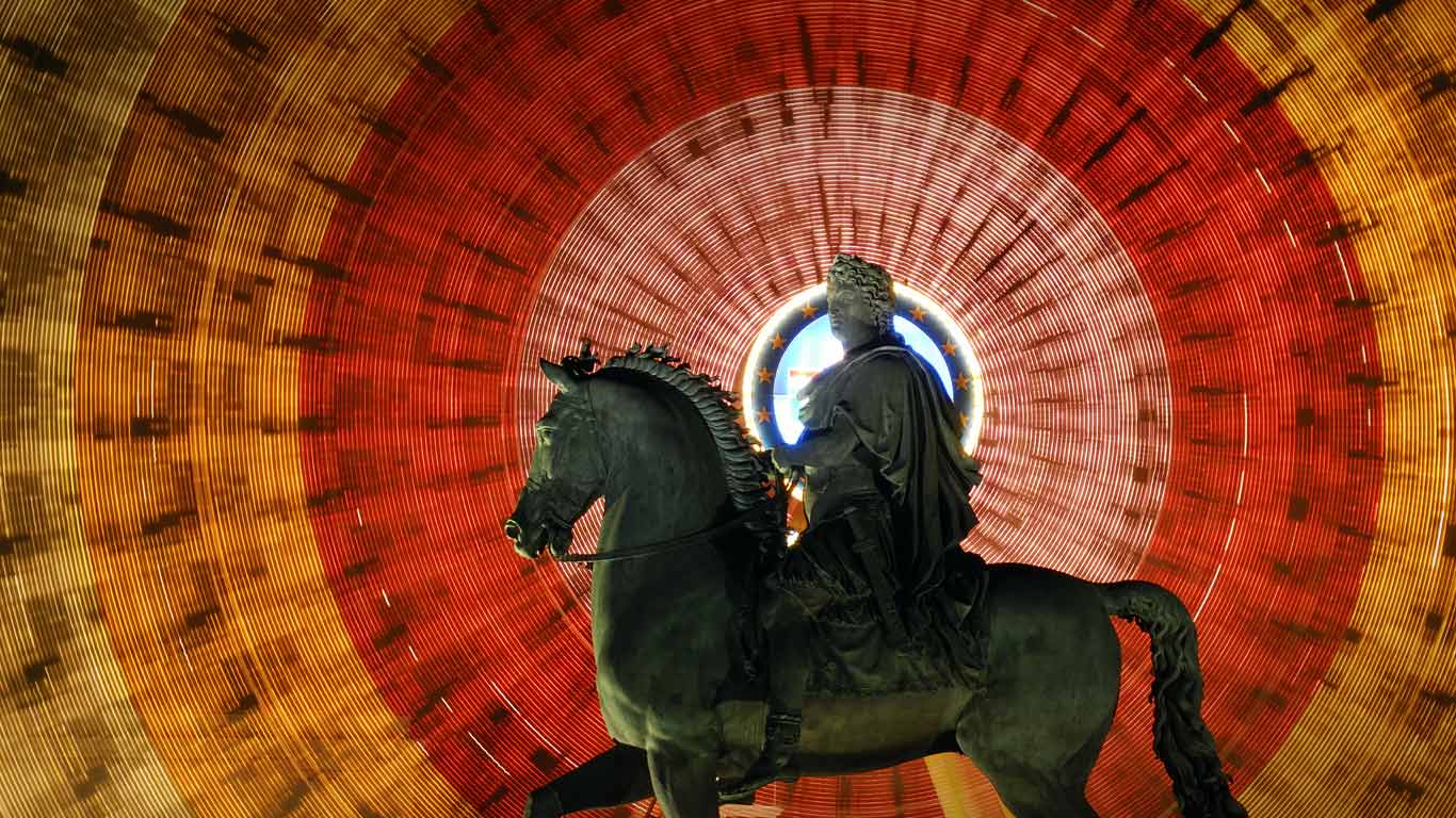 Louis XIV statue and spinning Ferris wheel at Place Bellecour in Lyon, France (© Arnaud Chicurel/Getty Images)(Bing United States)