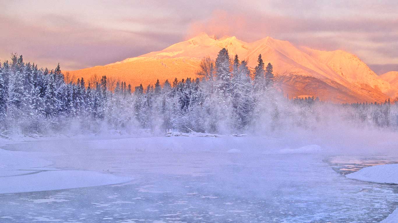Bulkley River with an alpenglow and a frosty snowy, ice filled river at Telkwa, B.C. (© Robert McGouey/All Canada Photos/Corbis)(Bing Canada)