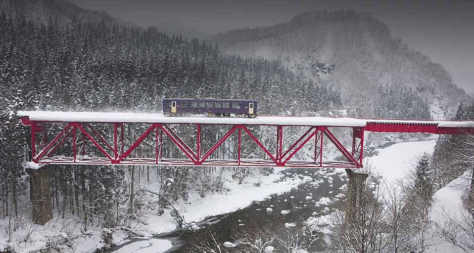 Akita Railway traveling over an iron bridge, Tohoku, Japan -- Japan Travel Bureau/Photolibrary &copy; (Bing United Kingdom)