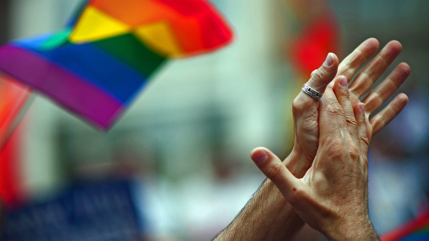 Rainbow flag and clapping hands (© Navid Baraty/Moment/Getty Images)(Bing United Kingdom)