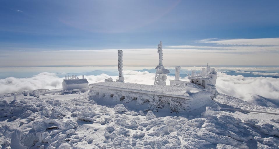 The Mount Washington Observatory, completely covered in hard rime ice, on the summit of Mount Washington, New Hampshire, USA – Mike Thesis/Getty Images &copy; (Bing United Kingdom)