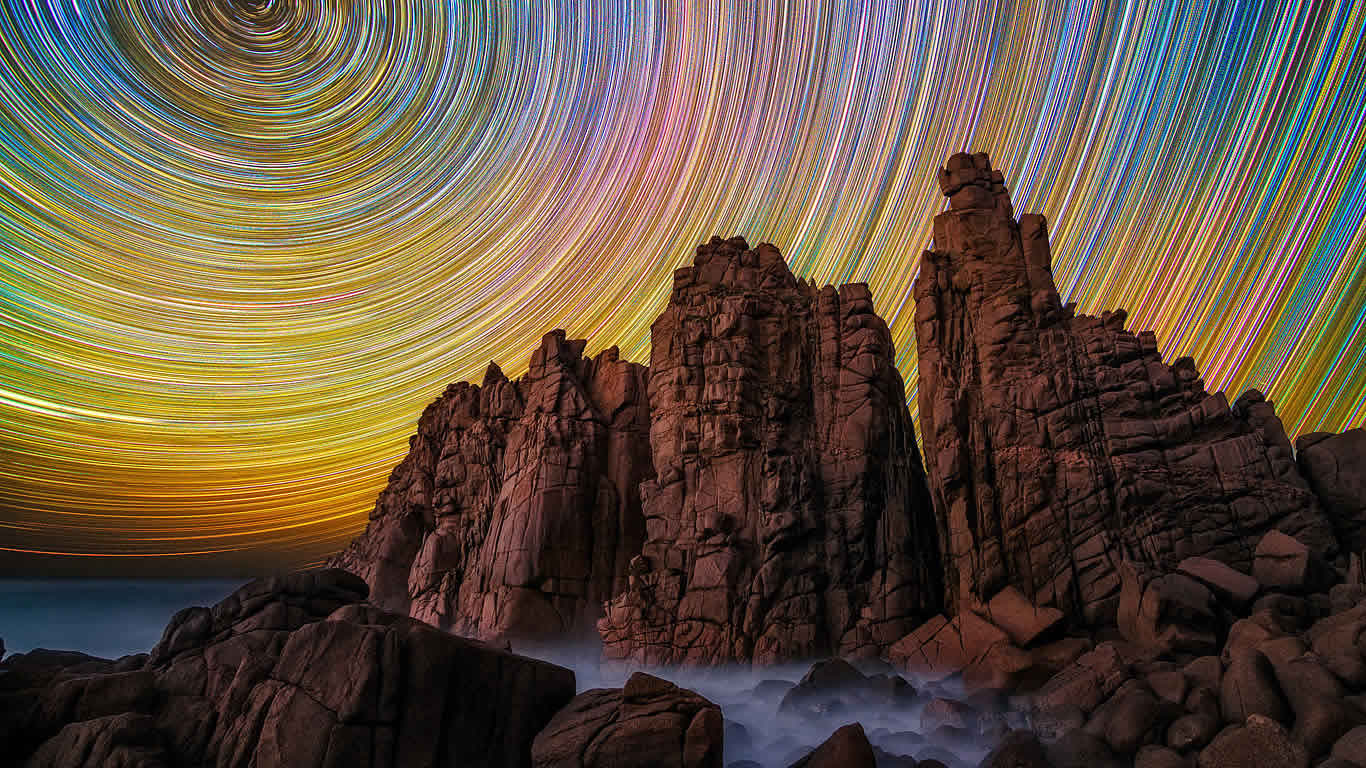 Star trails at Cape Woolamai in Victoria, Australia (© Lincoln Harrison/Solent News/Rex Features)(Bing Australia)