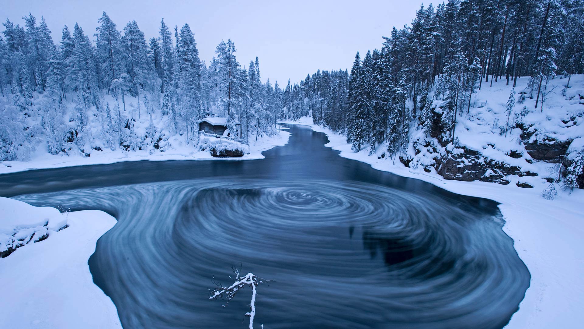The whirlpool in Myllykoski scenic area at winter in Oulanka National Park, Kuusamo, Finland (© Lassi Rautiainen/Minden Pictures)(Bing United Kingdom)