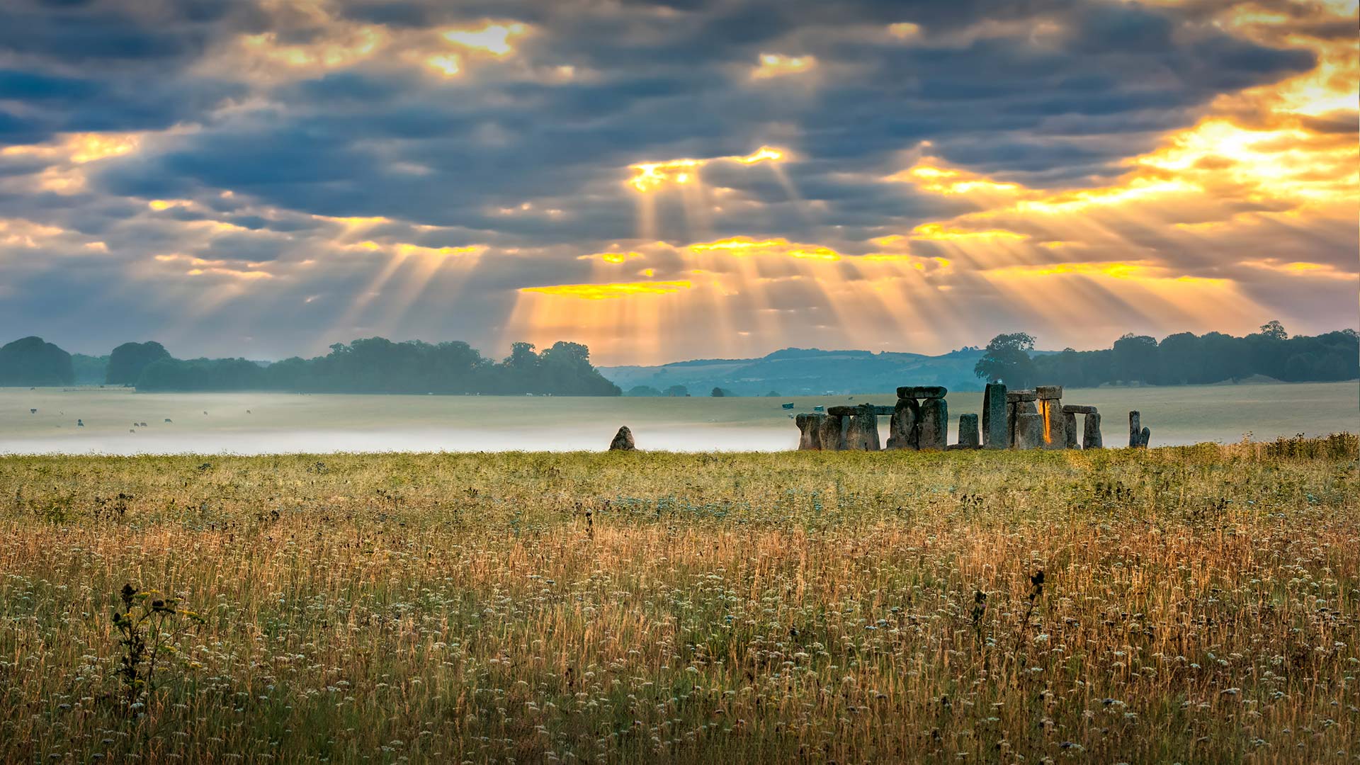 Cloudy sunrise over Stonehenge - prehistoric megalith monument arranged in circle. (© Valery Egorov/Getty Images)(Bing United Kingdom)