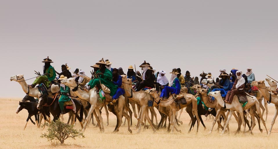 Wodaabe nomads traveling across the desert in Niger, West Africa -- Hugh Sitton/Getty Images &copy; (Bing United Kingdom)