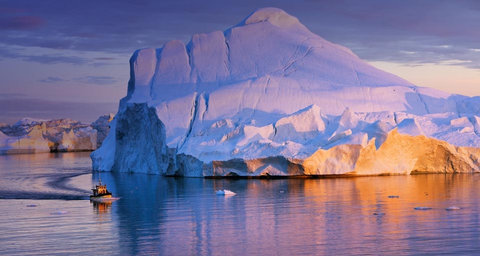 Tour Boat and iceberg in Disko Bay, Greenland -- Frank Krahmer/Masterfile &copy; (Bing United Kingdom)