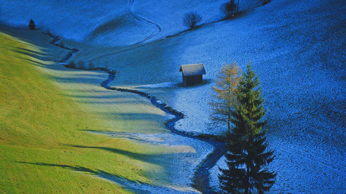 Sun defrosts half a meadow in Tulfes, Austria (© F1 Online/REX)(Bing United Kingdom)