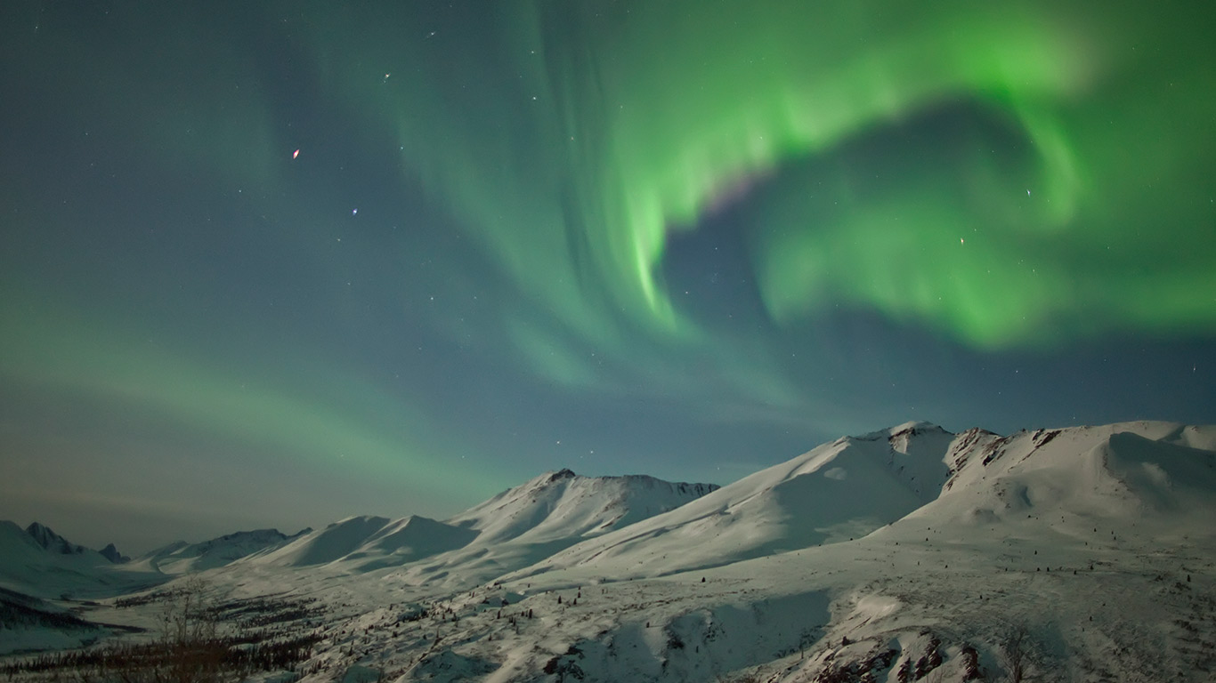 Aurora borealis dances over the Klondike Valley in Tombstone Territorial Park, Yukon (© Robert Postma/First Light/Corbis)(Bing Canada)