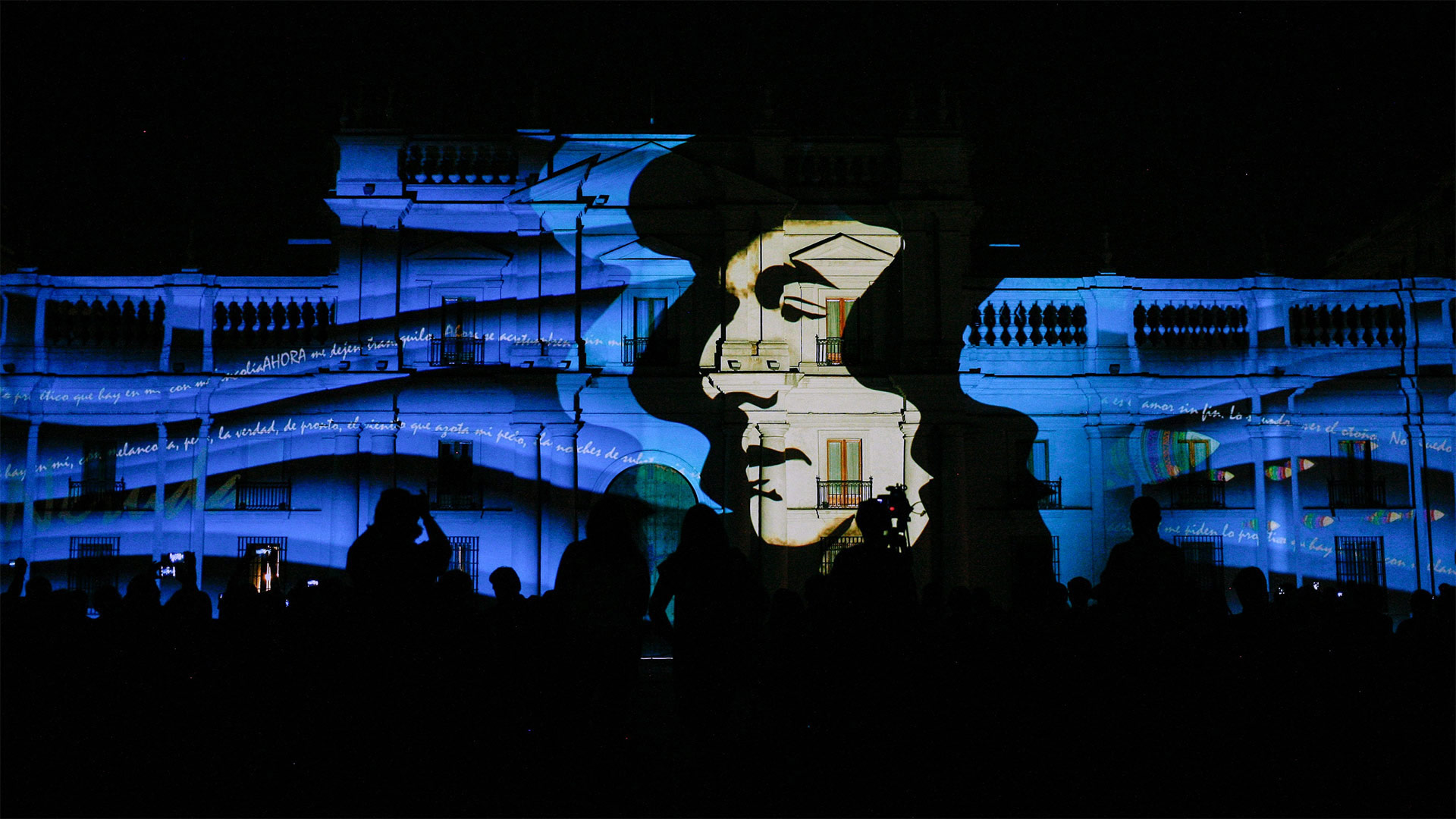 Portrait of poet Pablo Neruda projected on building, Santiago, Chile (© Mario Tellez/Anadolu Agency/Getty Images)(Bing Canada)
