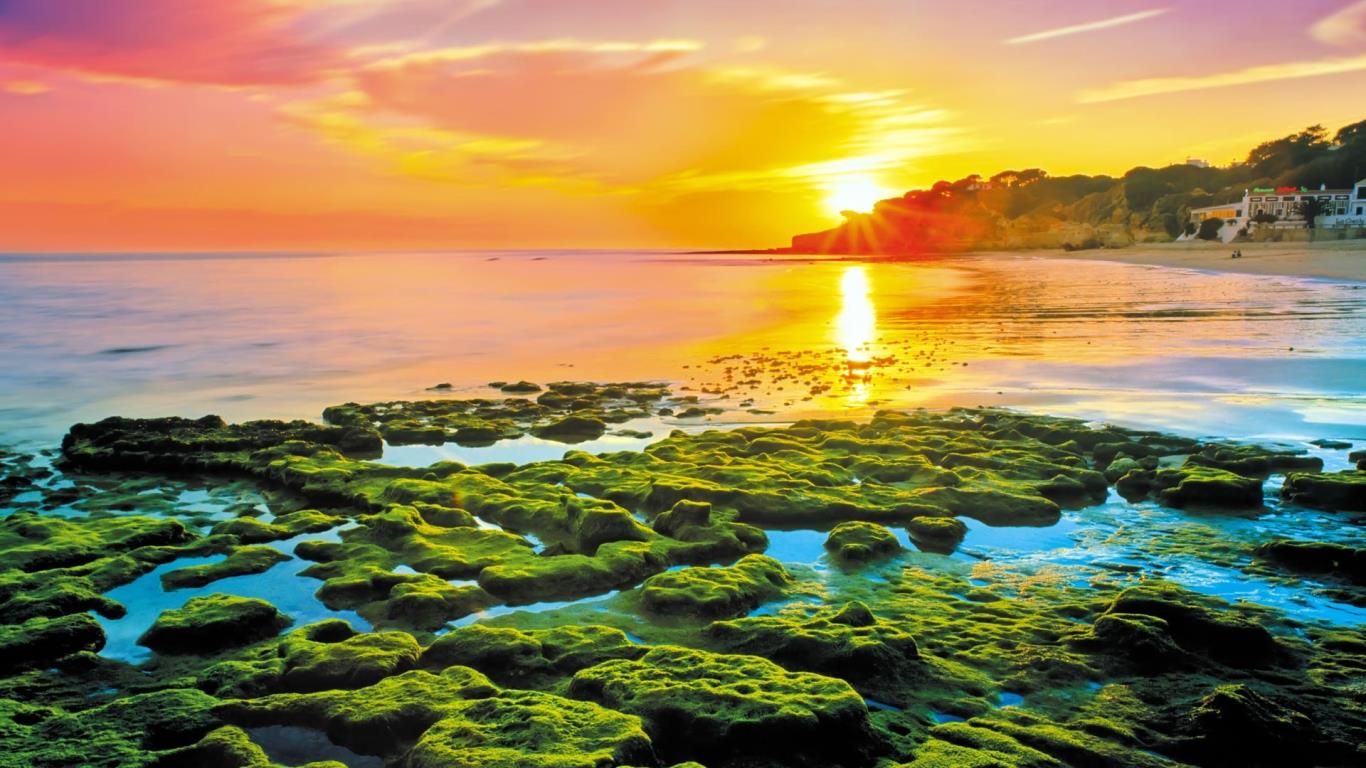 葡萄牙阿尔加维，阿尔布费拉的海滩日落 (© Cro Magnon/Alamy)(Bing China)