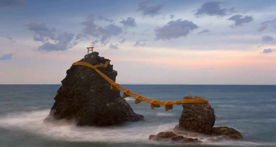 Meoto-Iwa (Wedded Rocks), two rocks considered to be male and female and joined in matrimony by sacred ropes, renewed in a special festival each year, Honshu, Japan -- Gavin Hellier/Corbis &copy; (Bing United Kingdom)