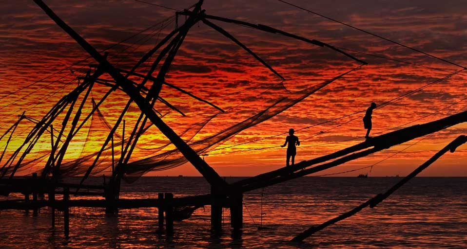 People fishing at sunset near Kerala, India (© Anders Blomqvist/Lonely Planet Images) &copy; (Bing United Kingdom)