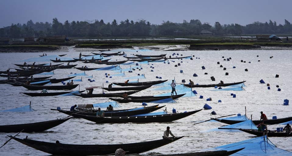Fishermen set nets for shrimp larvae passing on the river current, Khulna Province, Bangladesh -- Tim Laman/Getty Images &copy; (Bing United Kingdom)