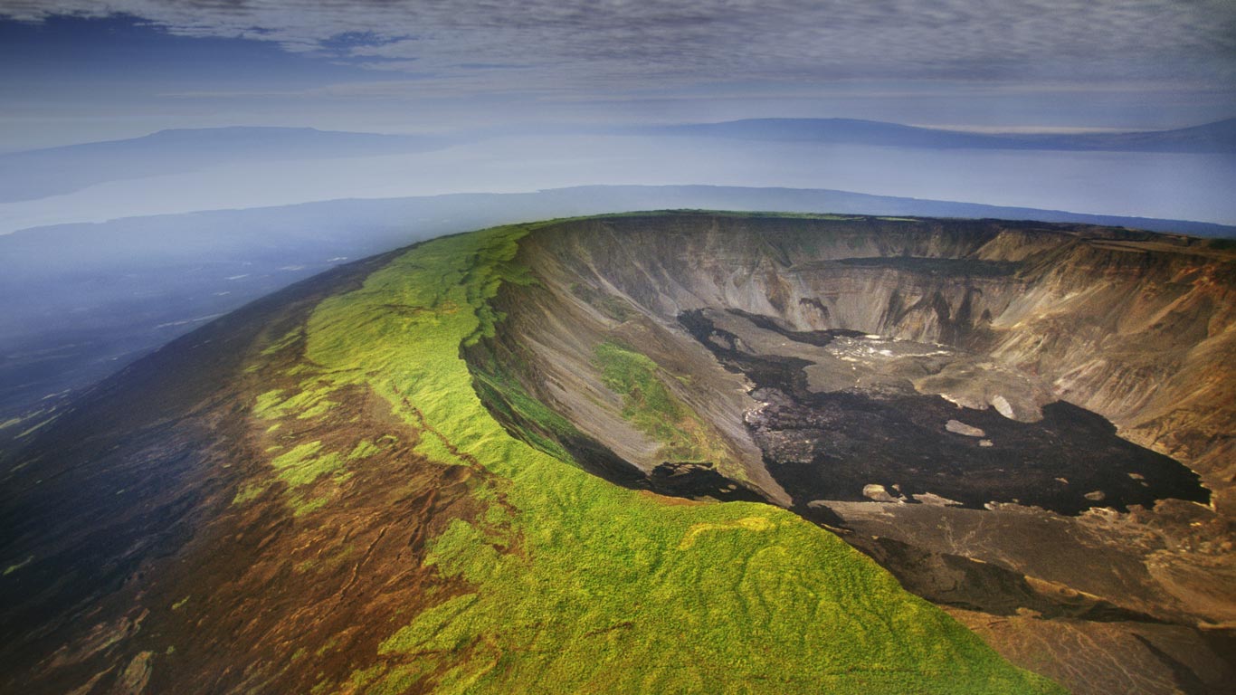 Aerial view of a volcano caldera, Isabela Island, Galápagos Islands, Ecuador (© Frans Lan/age fotostock)(Bing United Kingdom)