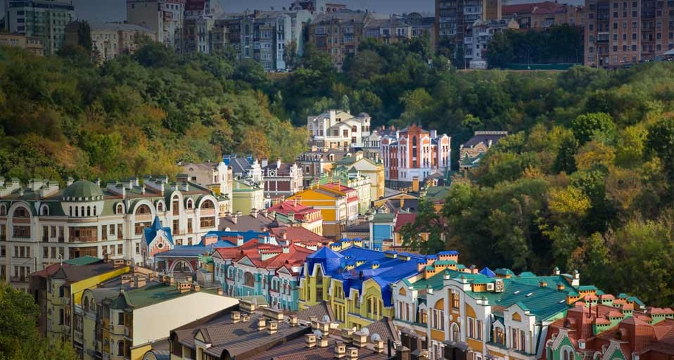 Elevated view over colourful buildings with multicolour roofs in a new residential area of Kiev, Ukraine -- Gavin Hellier/Corbis &copy; (Bing United Kingdom)