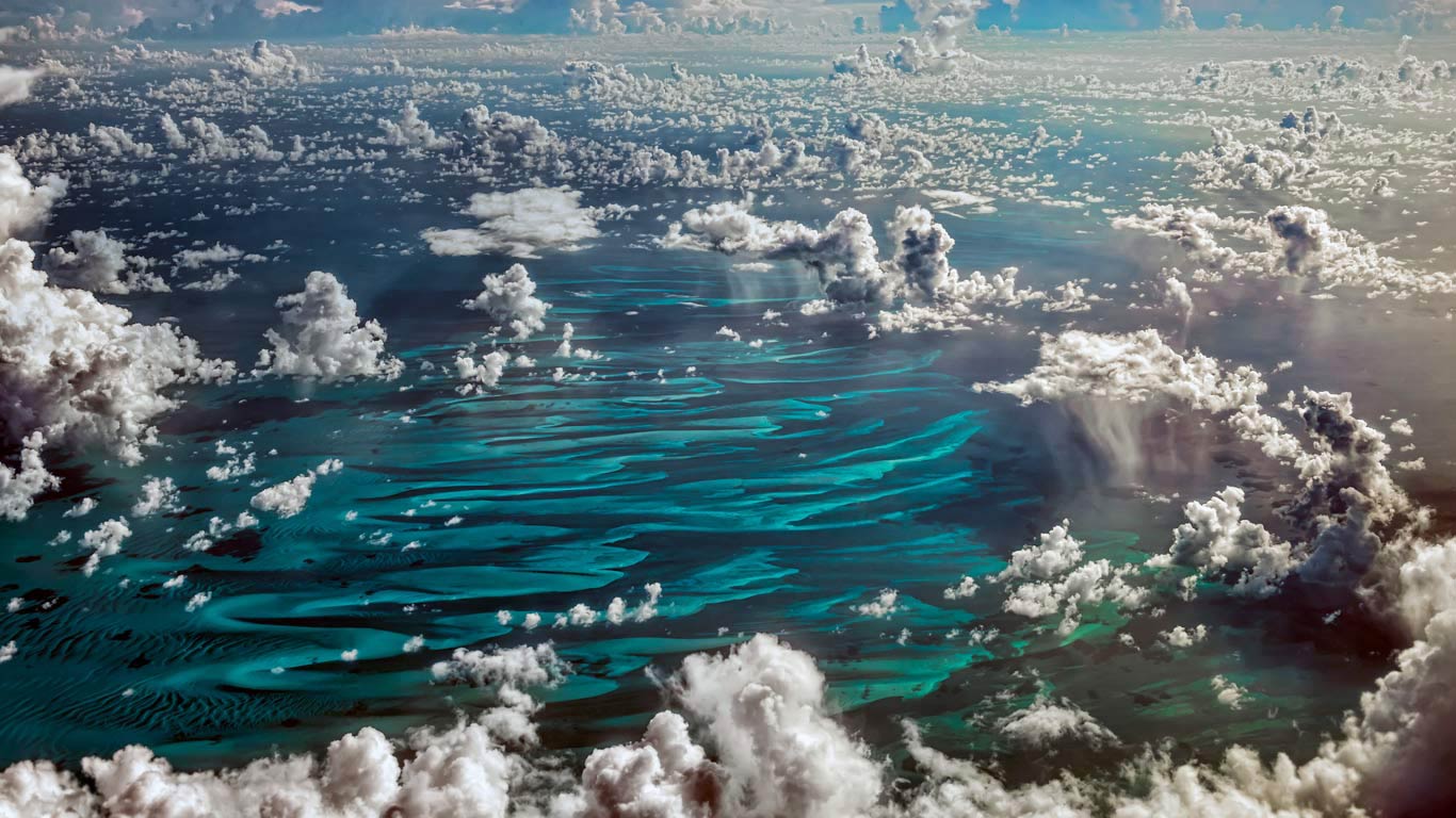Cumulus clouds over the Caribbean (© F. M. Kearney/plainpicture)(Bing Canada)