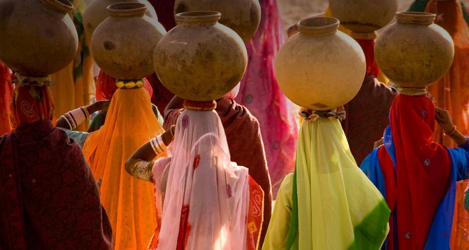 Women carrying pots, Rajasthan, India -- Eric Meola/Getty Images &copy; (Bing United Kingdom)