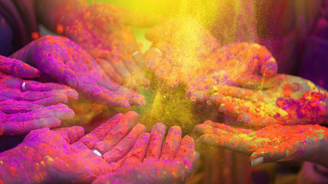 People celebrating Holi festival in India (© Peter Zelei/Getty Images)(Bing United Kingdom)