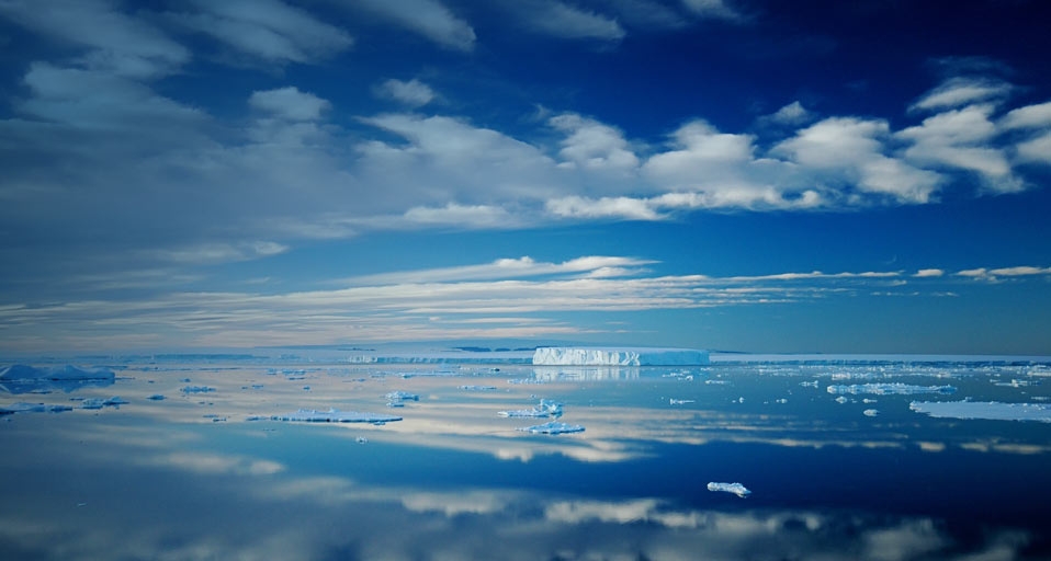 Antarctic iceberg and cloud landscape reflecting in totally calm waters near Ross Island, Antarctica -- A Rose/age fotostock &copy; (Bing United Kingdom)