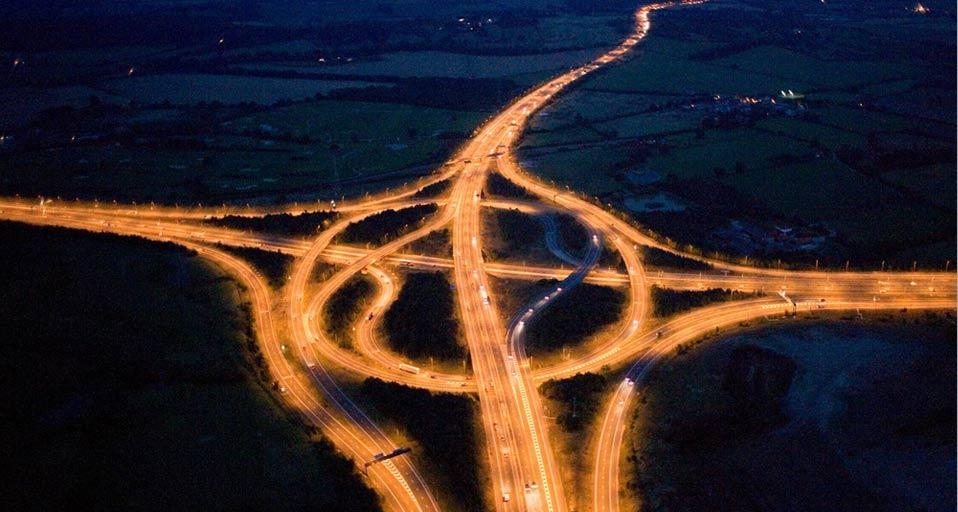 Junction of the M25 and M11 motorways at night, Essex, England (© Jason Hawkes/Corbis) &copy; (Bing United Kingdom)