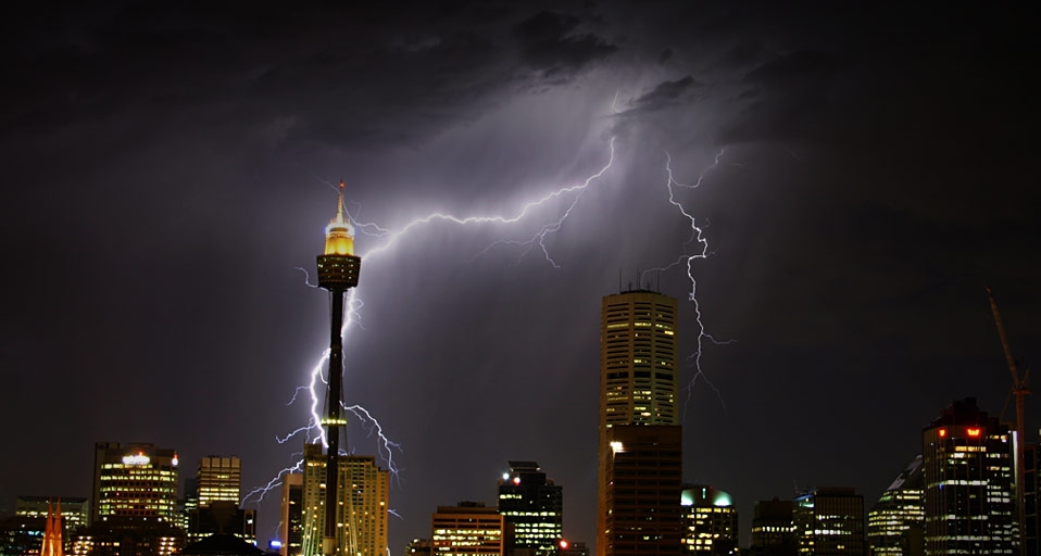 A summer storm envelops the Sydney skyline. This photo by Jeremy Somers won our first ever Facebook Photo Contest as voted by Fans of Bing. Congratulations! &copy; (Bing United States)