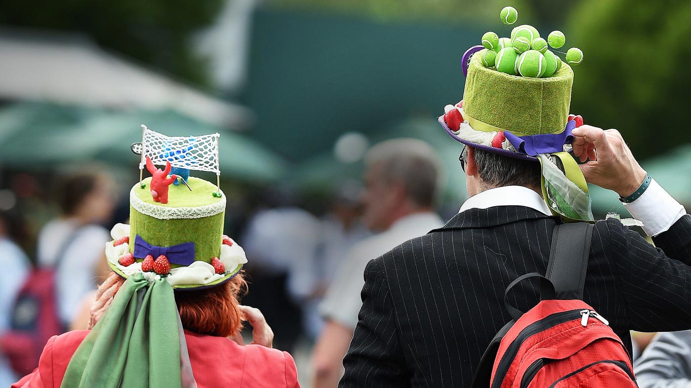 Spectators wearing hats at Wimbledon in 2017 (© Oli Scarff/Getty Images)(Bing United Kingdom)