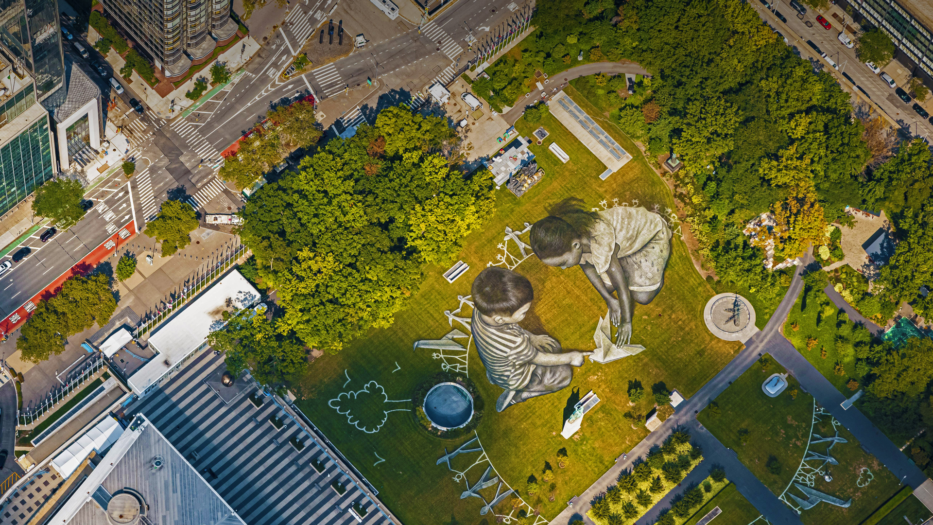 'World in Progress II,' a land art painting by Saype, United Nations Headquarters, New York City (© Valentin Flauraud/Shutterstock)(Bing United States)