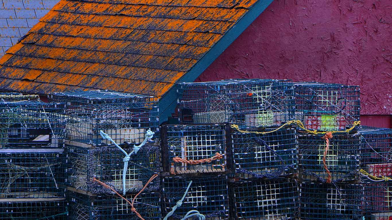 Lobster traps stacked waiting for the lobster fishing season on the Bay of Fundy in Canada.(© Ruth Burke/Alamy)(Bing Canada)