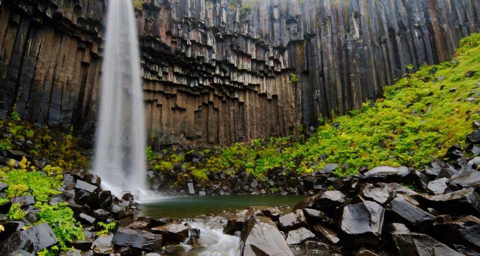Svartifoss waterfall flanked by hexagonal basalt columns in Vatnajökull National Park, Iceland (© Martin Moos/Lonely Planet Images) &copy; (Bing United Kingdom)