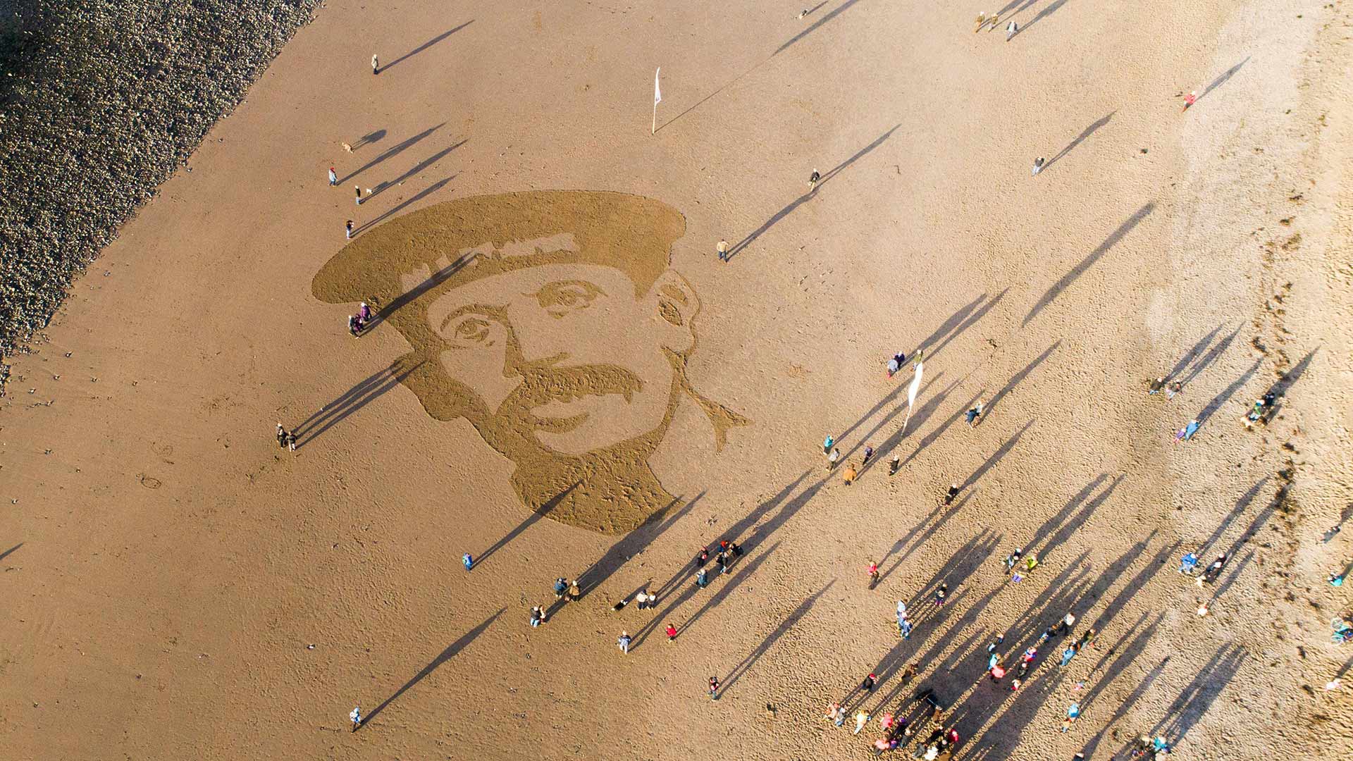 Sand portrait of WW1 Royal Naval Reservist Richard Davies on Ynyslas Beach, Ceredigion  (© Keith Morris Aerial Imagery/Alamy Stock Photo)(Bing United Kingdom)