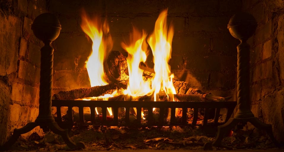 Fire in fireplace (© Tetra Images/SuperStock) &copy; (Bing United Kingdom)