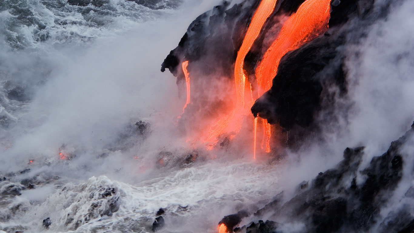 Viscous lava from Kilauea pours into the ocean at Kalapana, Hawaii (© Ron Dahlquist/Aurora Photos)(Bing United States)