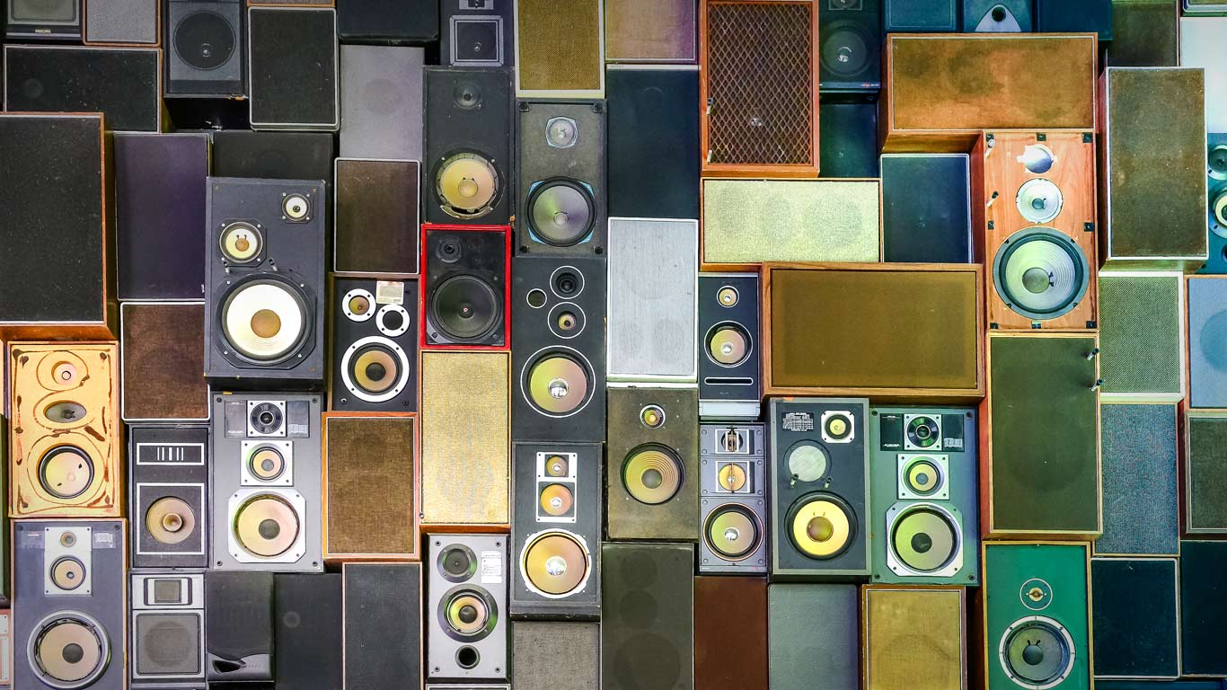 Retro music speakers hanging on a wall (© Martin M303/Getty Images)(Bing United Kingdom)