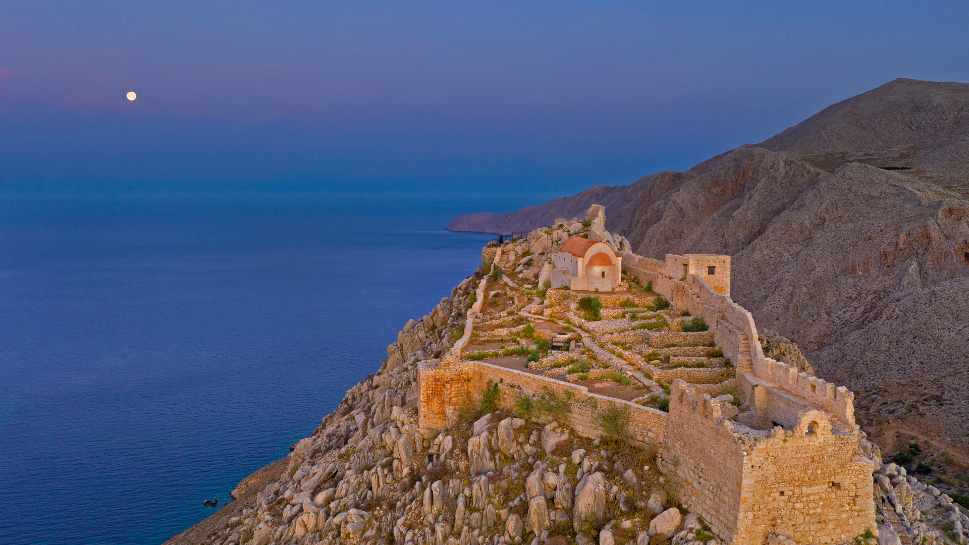 Ruins of the medieval castle of the Knights of St. John above the village of Chorio, Halki Island, Greece (© Massimo Ripani/eStock Photo)(Bing United States)