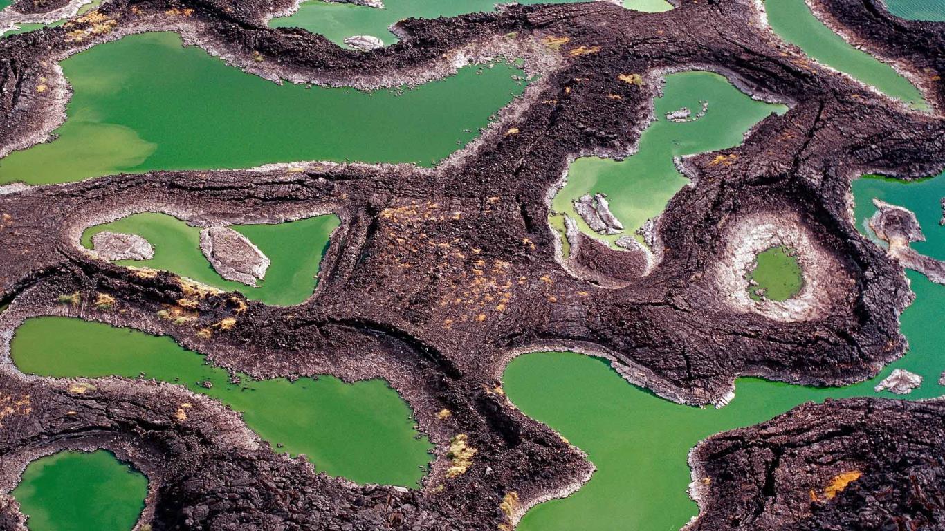 Lava rock pools at the southern end of Lake Turkana, in Kenya (© Nigel Pavitt/Corbis)(Bing United States)