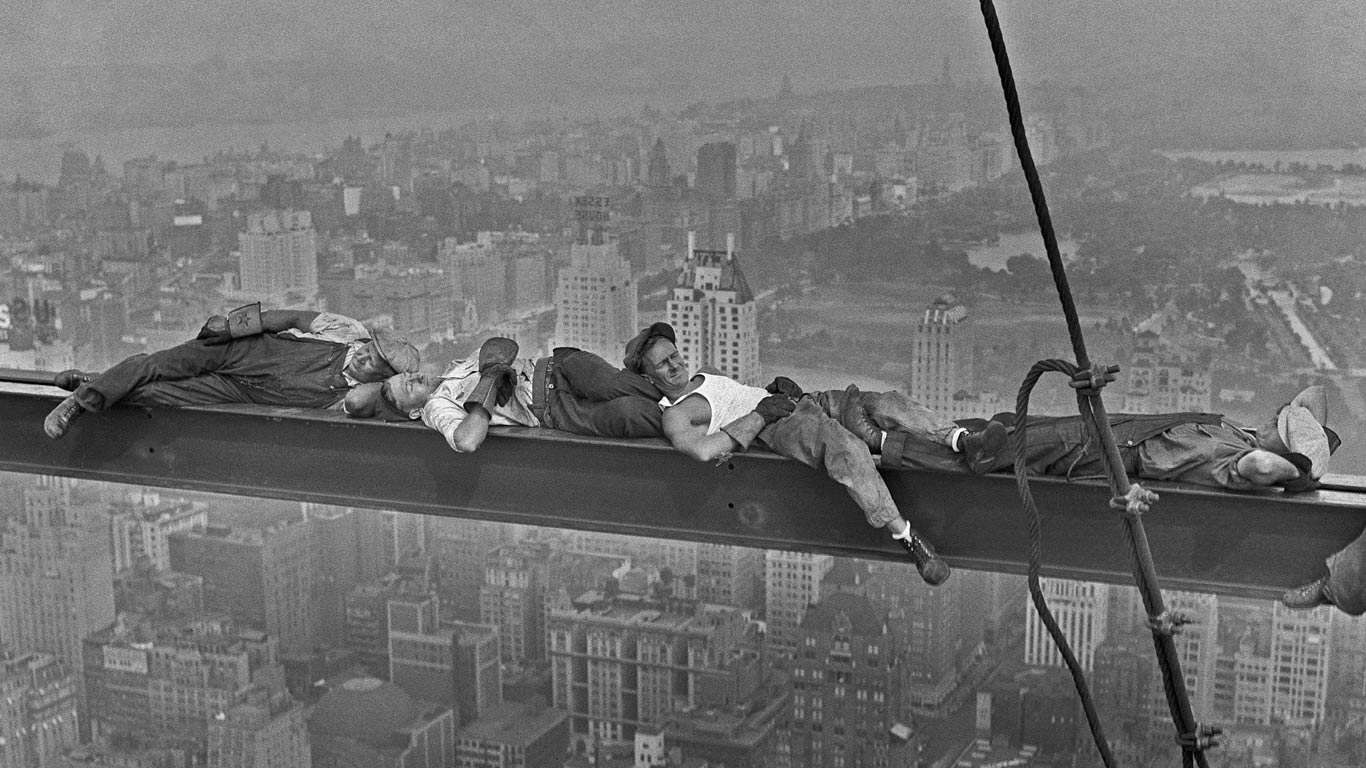 Happy Labor Day. Construction workers rest above 1930s Manhattan. (© Bettmann/Getty Images)(Bing United States)