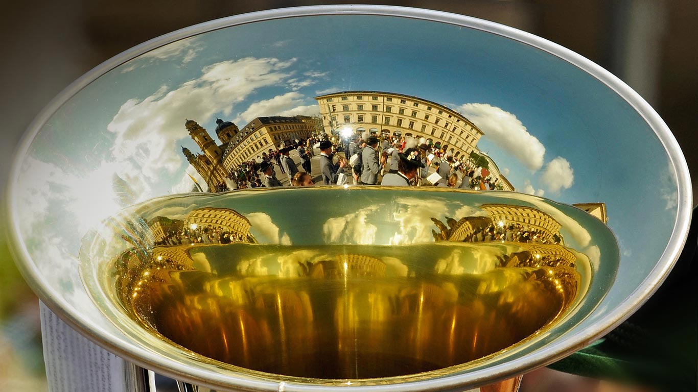 A marching band is reflected in the bell of a horn during Oktoberfest in Munich, Germany (© Joerg Koch/Getty Images)(Bing United Kingdom)
